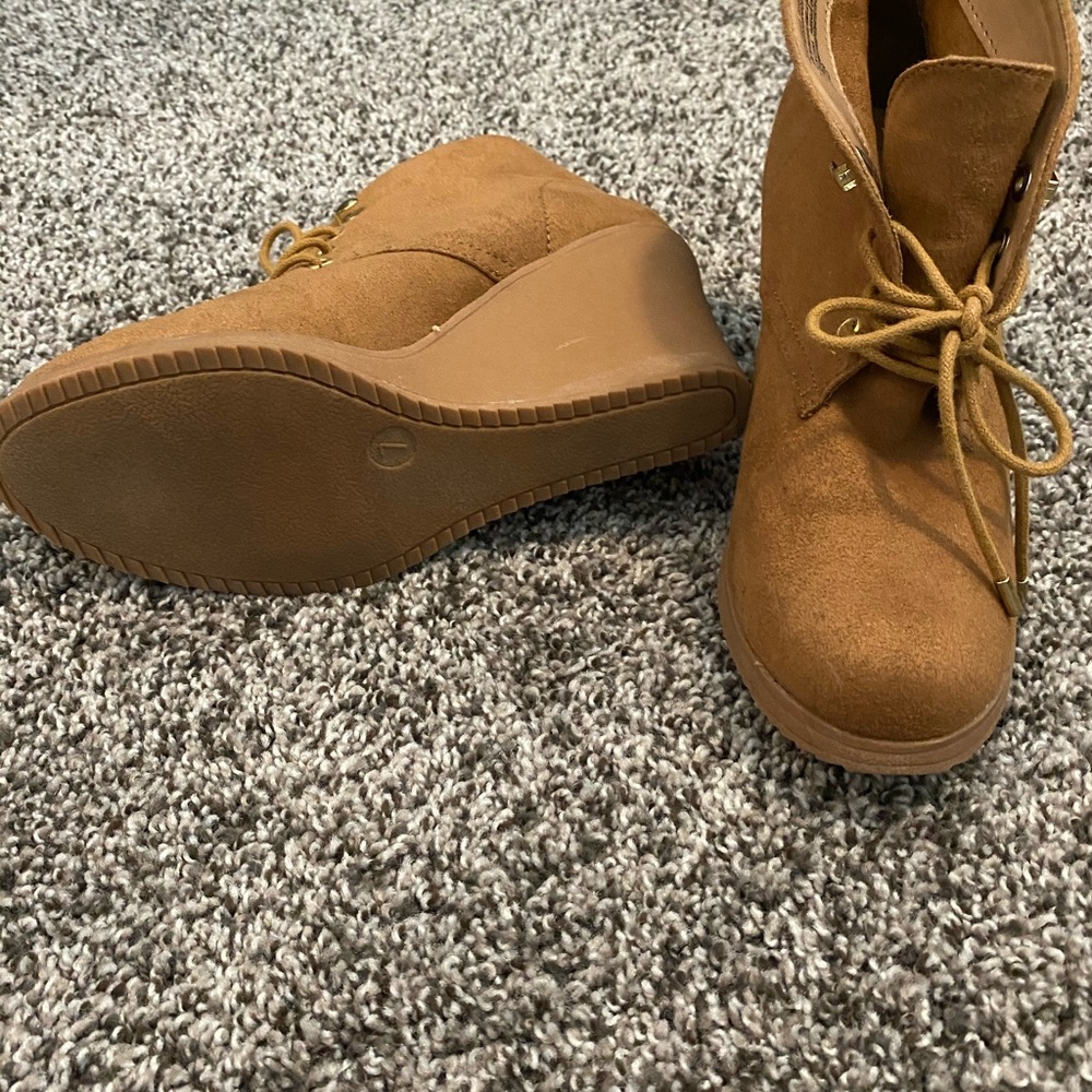 Camel colored suede wedges.